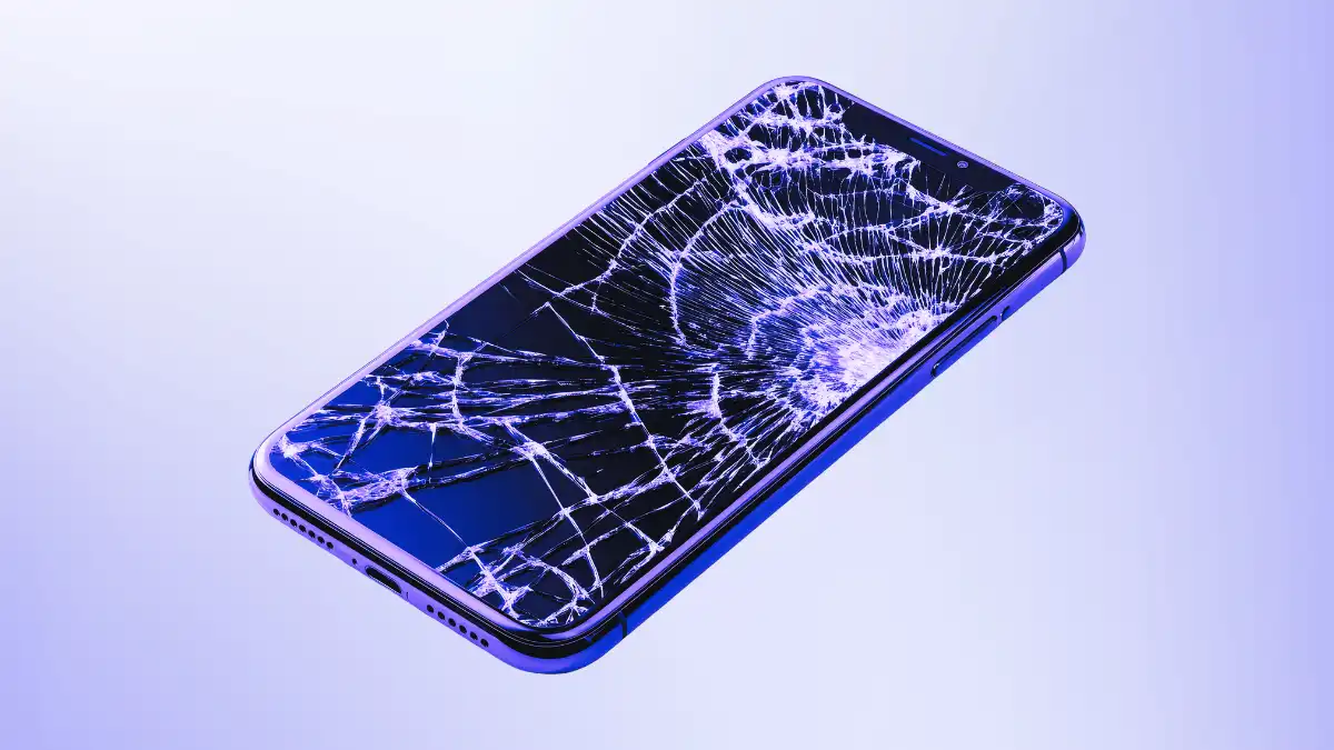 Cracked smartphone screen representing low-end device failure as SaaS platforms move away from supporting constrained hardware